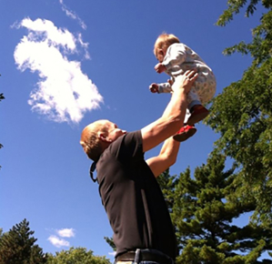 Baby Giselle with her dad