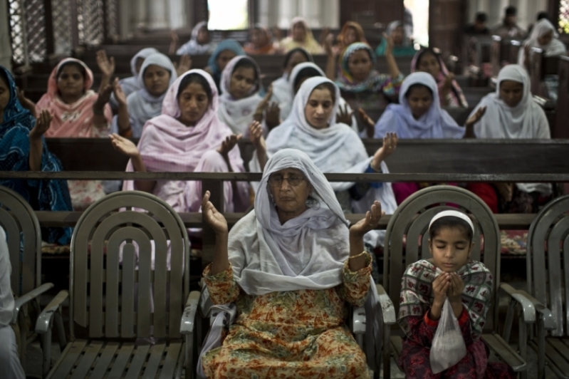 Christians praying inside church