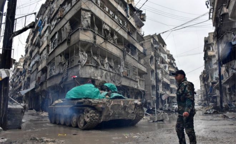 Syrian pro-government forces moved through the Jisr al-Haj neighborhood on Wednesday.