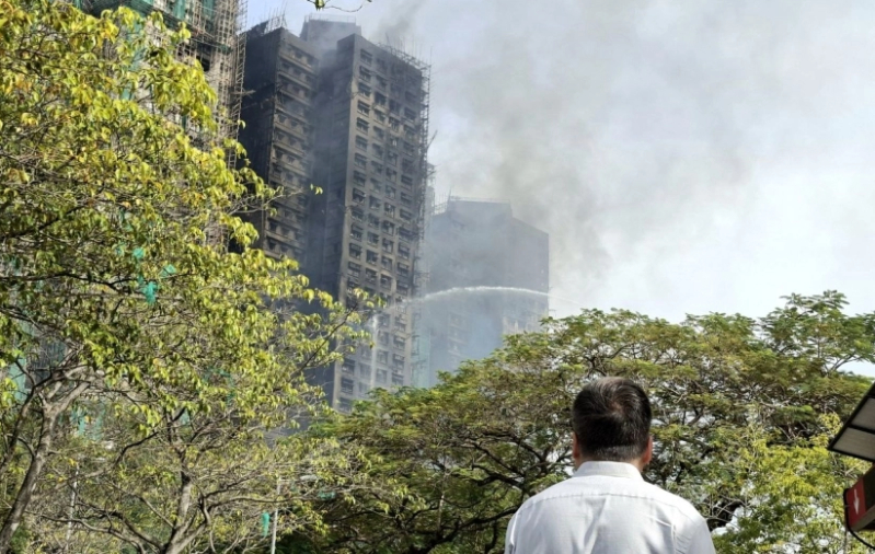 Christian pray in scene of fire