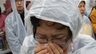 'We Are Not Dead Yet':  Passengers Text Loved Ones While Trapped on South Korean Sinking Ferry