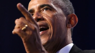 President Obama Sends Mixed Messages after Republican Landslide