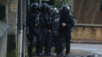 Charlie Hebdo Attack Update: Manhunt for Suspects Spreads to Northern France 