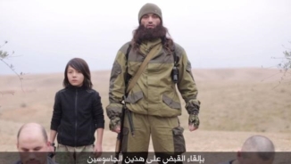 New ISIS Video Shows Young Boy Callously Executing 'Russian Spies'