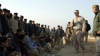 Suicide Bombers Make It onto Iraq Base Used by U.S. Marines after ISIS Seized Nearby Town