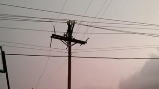 Oklahoma Teen Shares Inspirational Image of Cross Formed from Wreckage of Wednesday's Tornadoes [Hand of God Cloud Photo]