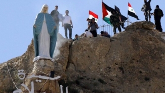 Ancient Assyrian Christian Town Restores Statue of Virgin Mary as Symbol of Peace After Reclaiming Town from Rebels