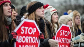 Supreme Court Blocks Restrictions on Texas Abortion Clinics, Halts Shutdown of Nine Facilities 