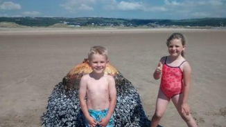 Family Photographs Kids With 'Beach Buoy' That Was Actually a Live Bomb, WWII Bomb Detonated Harmlessly in Wales