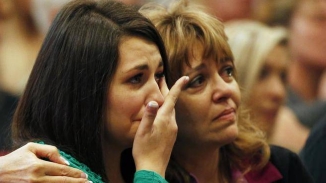 Oregon Pastor Reveals His Daughter Escaped Shooter's Bullets by Praying, Playing Dead Covered in Classmate's Blood 