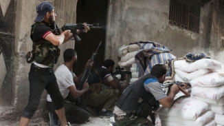 Syrian Rebels Seize Key Town In West In Blow To Government