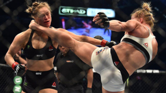 Ronda Rousey Faces Critics With A Smile, Poses For Pics After Holly Holm Defeat