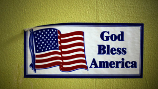 'God Bless America' Signs Flourish after Atheists File Lawsuit Over Kansas Post Office 'God Bless' Banner