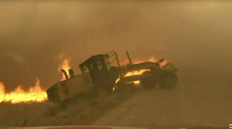 Oklahoma Man Rescued from Wildfire by Storm Trackers: 'God Was Watching Out For Us'