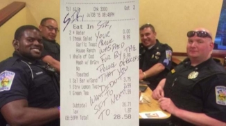 Police Officer Picks Up Tab for Couple Who Refused to Sit Next to Him: 'We Must Break This Us-Against-Them Mentality' 