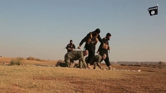 ISIS Released Propaganda Video Showing Soldiers Crawling Like Dogs, Burned Alive 