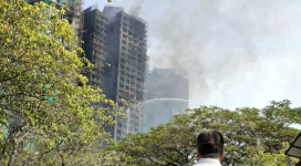 Christian travels to Wang Fuk court fire site to pray, firmly believes God will intervene to change the situation